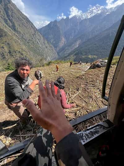Image for Nepal urges villagers to evacuate after flood triggered by landslide