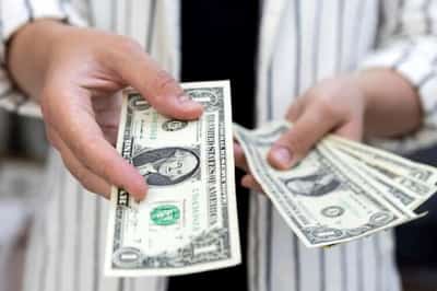 Image for Dollar skulks at eight-month low, central bank meetings in focus