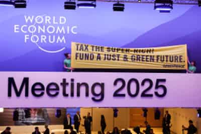 Image for Greenpeace activists slip through Davos security to stage climate protest