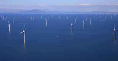 Image for Orsted reports earnings hit by low wind speeds, cable issues
