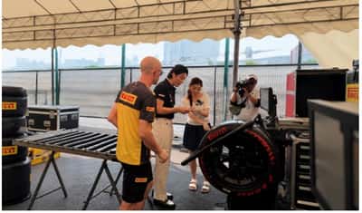 Image for Yun Si Yun Explores Pirelli Garage at Singapore F1, Gets Hands-On Experience with Race Tires