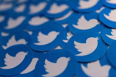 Image for Twitter blames Musk, weak ad market for drop in revenue