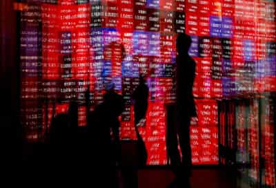 Image for Stocks lower, gold settles higher as Trump's tariffs spread uncertainty