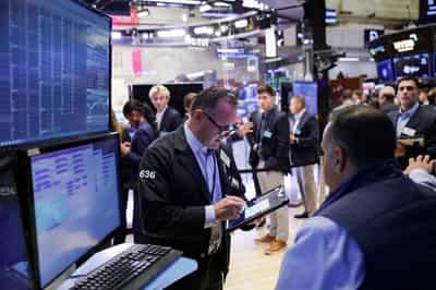Image for S&P 500 briefly tops 7,000 before pullback as Fed, Big Tech earnings loom