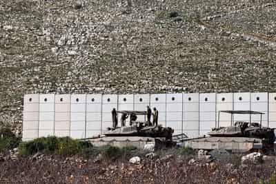 Image for Exclusive-Hezbollah returns to guerrilla roots, awaits Israeli invasion