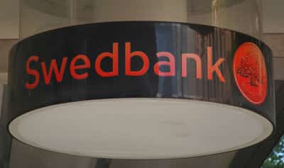 Image for Swedbank sets returns target of at least 15%, to end hiring freeze