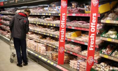 Image for UK retailers report record food inflation but see falls ahead