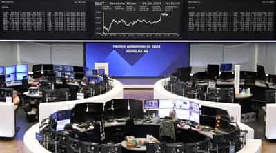 Image for Dollar hits 38-year high vs yen; stocks mostly ease
