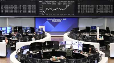 Image for Dollar hits 38-year high vs yen; stocks mostly ease