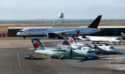 Image for Air Canada signs C$5.9 billion government aid package, agrees to buy Airbus, Boeing jets