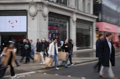 Image for British consumers defy forecasts and up their shopping again