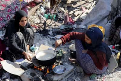 Image for Rats, dogs and torn clothes amid the ruins of Gaza homes
