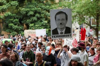 Image for Protests dog Israeli president's last day in Australia