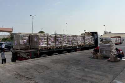 Image for Turned back from Gaza, aid shipments languish in warehouses, on roadsides