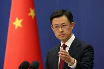 Image for Beijing, Berlin downplay tension after German foreign minister cancels China trip