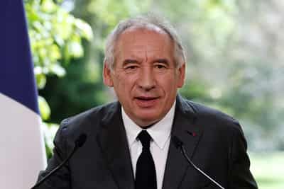 Image for French prime minister says he will introduce legislation on pensions after talks