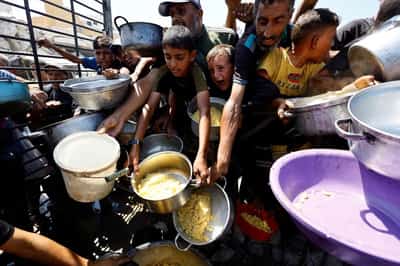 Image for Gaza no longer in famine after aid access improves, hunger monitor says