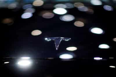 Image for Tesla apologizes after customer protested at autoshow, to share car data with Chinese regulator