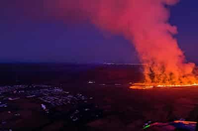 Image for Iceland volcano recedes after ‘black day’ of town fires