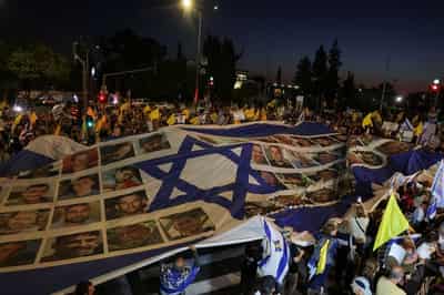 Image for Hamas hostage videos silenced Israeli media's talk of Gaza aid crisis