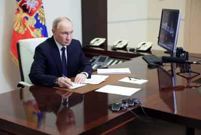 Image for Putin tells Trump Russia has to respond to Ukrainian attacks