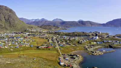 Image for Mining magnets: Arctic island finds green power can be a curse