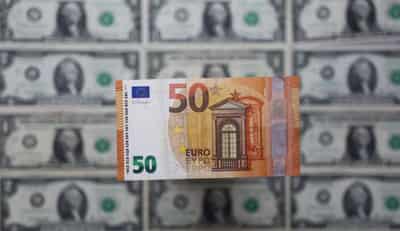 Image for Euro sinks to multi-year lows versus dollar, Swiss franc and sterling