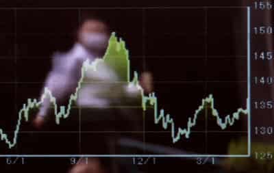 Image for Asia shares edge higher, wary of US bank data