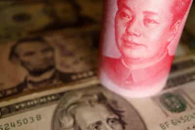 Image for Dollar gains as pound tumbles on cooling UK inflation
