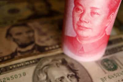 Image for Dollar gains as pound tumbles on cooling UK inflation