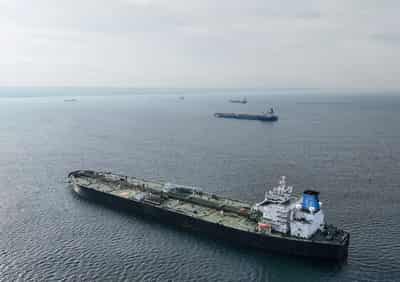 Image for Oil settles near 3-year low on weak demand outlook