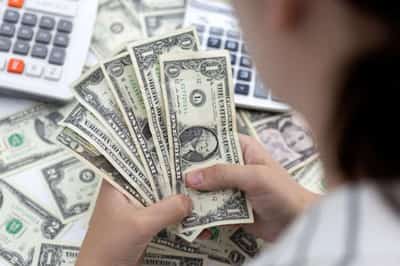 Image for Worst not over for EM currencies as U.S. dollar thunders on: Reuters poll