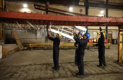 Image for UK factory activity shrinks slightly for first time since April, PMI shows