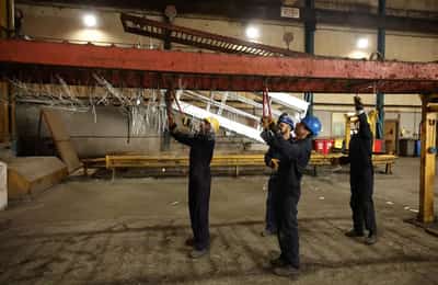 Image for UK factory activity shrinks slightly for first time since April, PMI shows