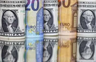 Image for Dollar slips as market awaits data for direction