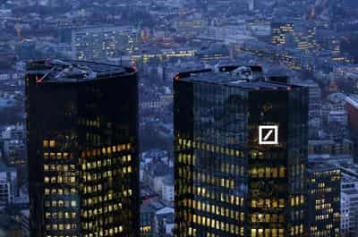 Image for Analysis: Merkel&#8217;s vote of confidence in Deutsche Bank belies lender&#8217;s problems