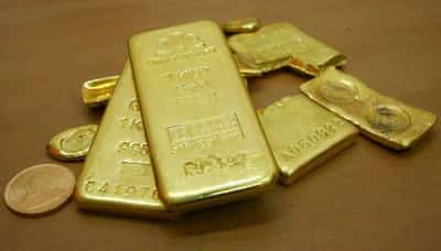 Image for Gold jumps, stocks stumble as Ukraine crisis deepens
