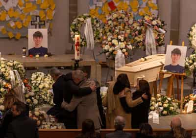 Image for Teen soccer players lay to rest mate killed in Swiss bar fire