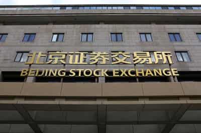 Image for China's stocks pare losses after early sell-off on fresh US trade war salvo