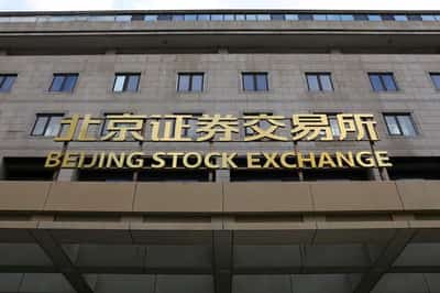 Image for China's stocks pare losses after early sell-off on fresh US trade war salvo