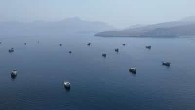 Image for Oil prices settle up more than $4 a barrel on renewed US-Iran fighting