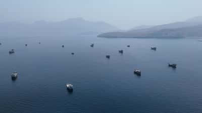 Image for Oil prices settle up more than $4 a barrel on renewed US-Iran fighting