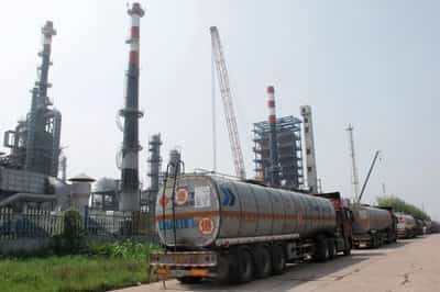 Image for China 'teapot' refiners halt plants as new fuel tax bites, sources say