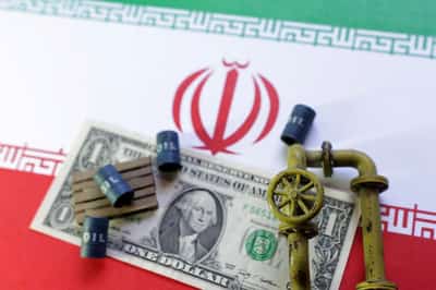Image for Oil settles almost 3% down on easing supply concerns ahead of US, Iran talks