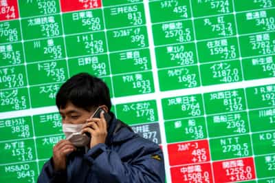 Image for Asian shares rise on dovish Fed chair, oil up as hurricane batters Louisiana
