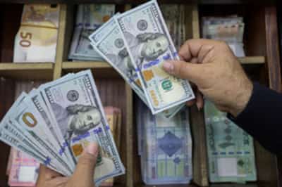 Image for Rising dollar pressures peers as further Fed cuts questioned
