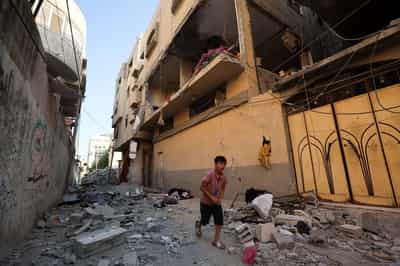 Image for Israeli fire kills five people in Gaza, including a child, medics say
