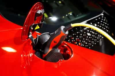 Image for Ferrari to churn out gas guzzlers on its slow road to electric