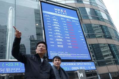 Image for Wall Street closes near record highs; precious metals rise