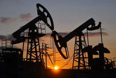 Image for Oil hits two-month low as US, IEA supply guidance weighs